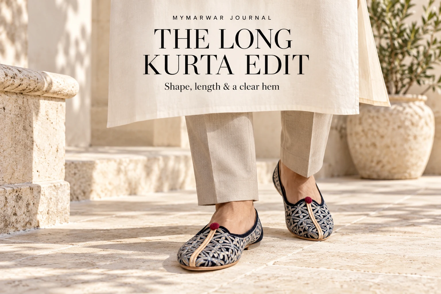 Long ivory kurta and stone trousers with black silver embroidered mojari
