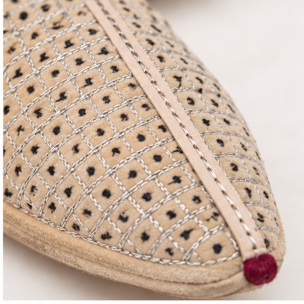 MyMarwar cream perforated mojari with dark zigzag trim for men, close-up of upper detailing