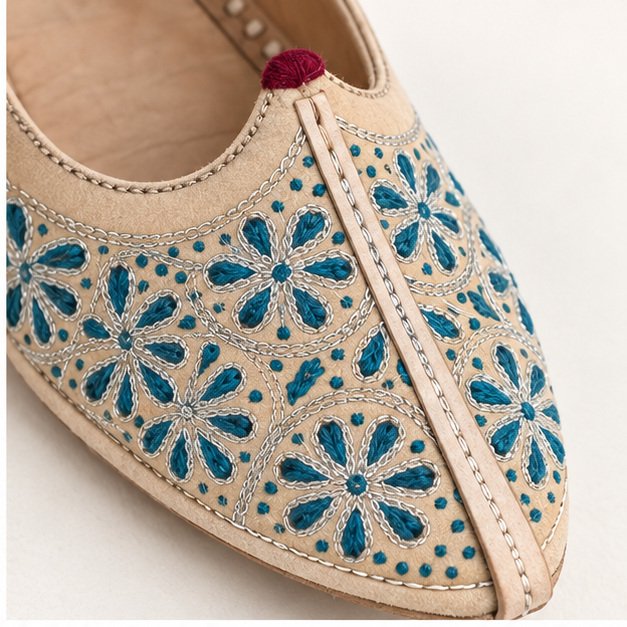 MyMarwar beige jutti with teal floral embroidery for men, close-up of upper detailing