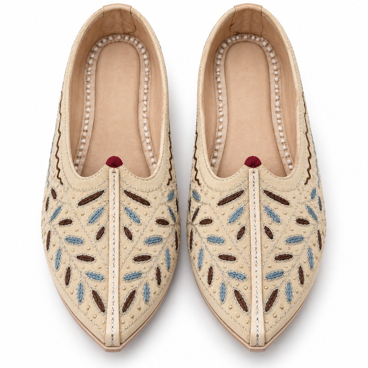 MyMarwar beige, blue and brown mojari for men with scattered leaf embroidery, angled view of embroidery and shape