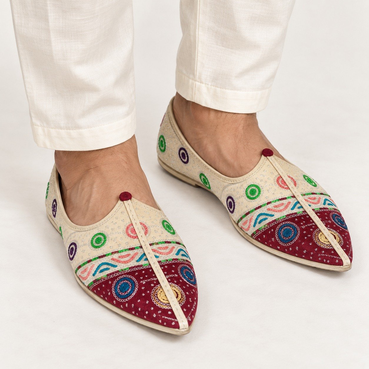 MyMarwar beige, burgundy, green and multicolour mojari for men with circle and ring embroidery, worn with an ethnic outfit