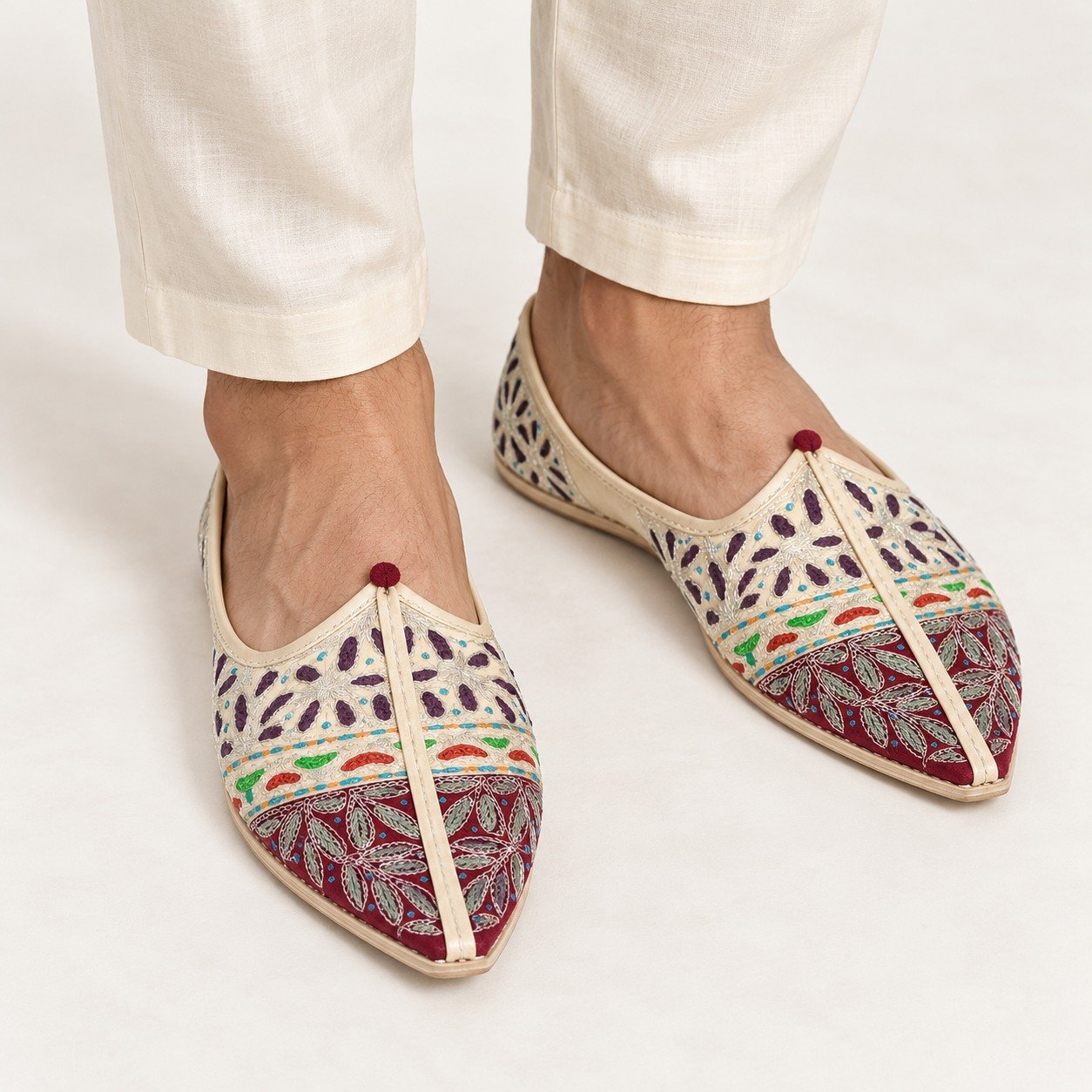 MyMarwar beige, burgundy and multicolour mojari for men with diamond and leaf embroidery, worn with an ethnic outfit