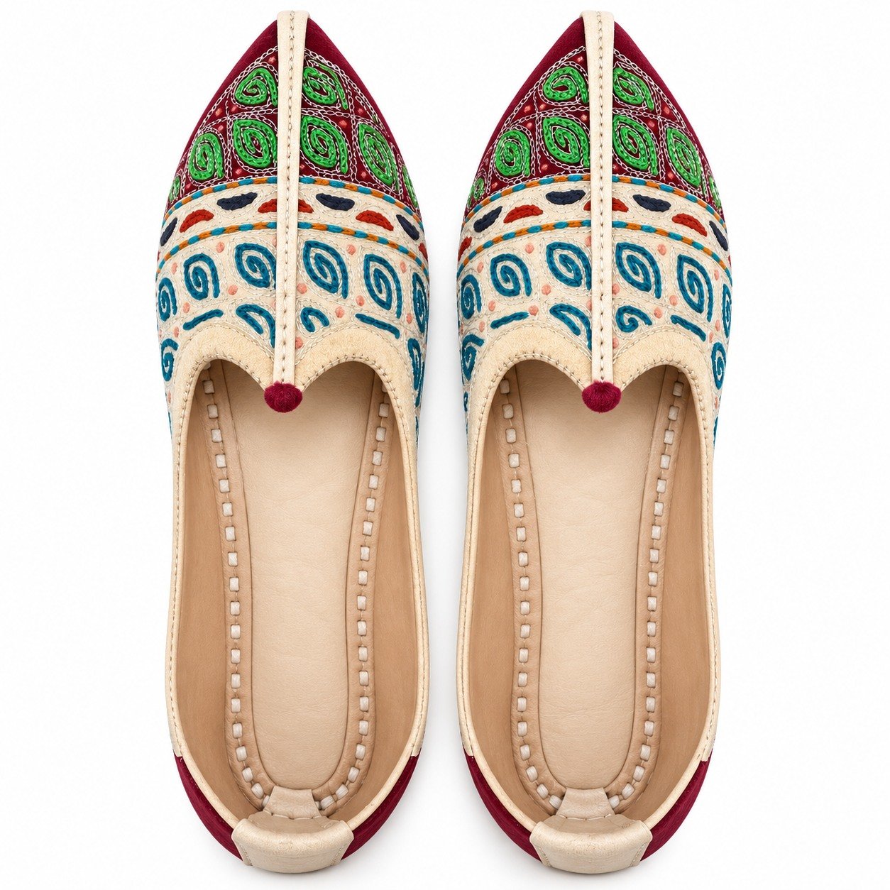 MyMarwar beige, burgundy, green and teal mojari for men with paisley and spiral embroidery, pair viewed from above