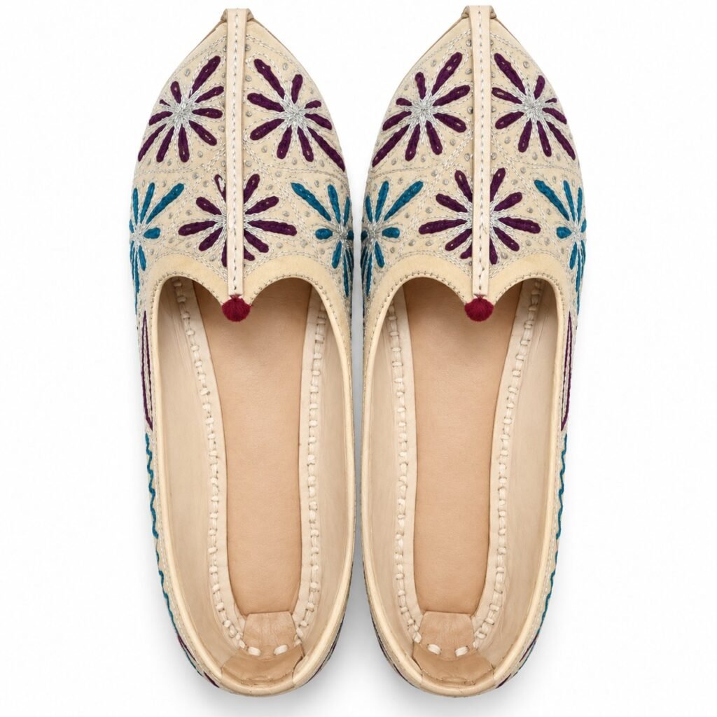 MyMarwar beige, plum and teal mojari for men with large flower embroidery, pair viewed from above