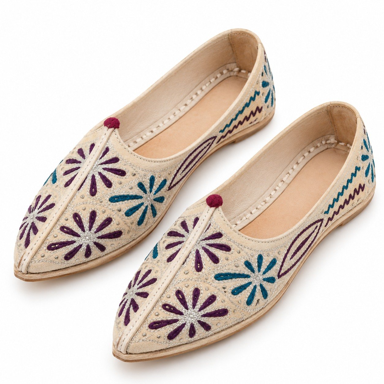 MyMarwar beige, plum and teal mojari for men with large flower embroidery, angled view of embroidery and shape