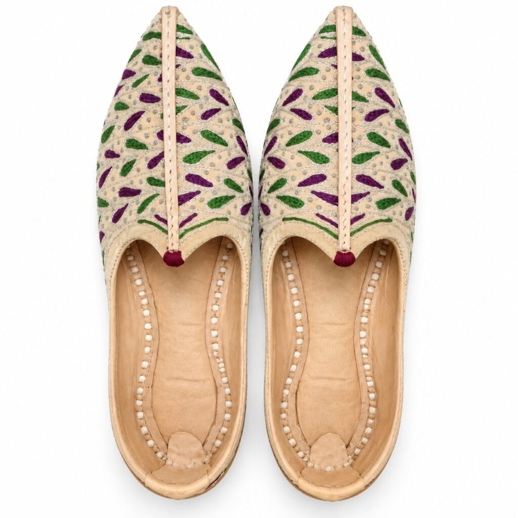 MyMarwar beige, purple and green mojari for men with purple and green leaf embroidery, pair viewed from above