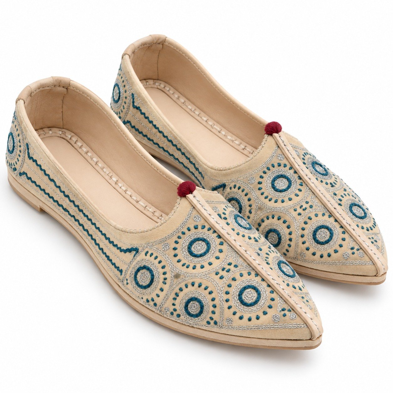 MyMarwar beige, teal and silver tones mojari for men with ring and dot embroidery, angled view of embroidery and shape