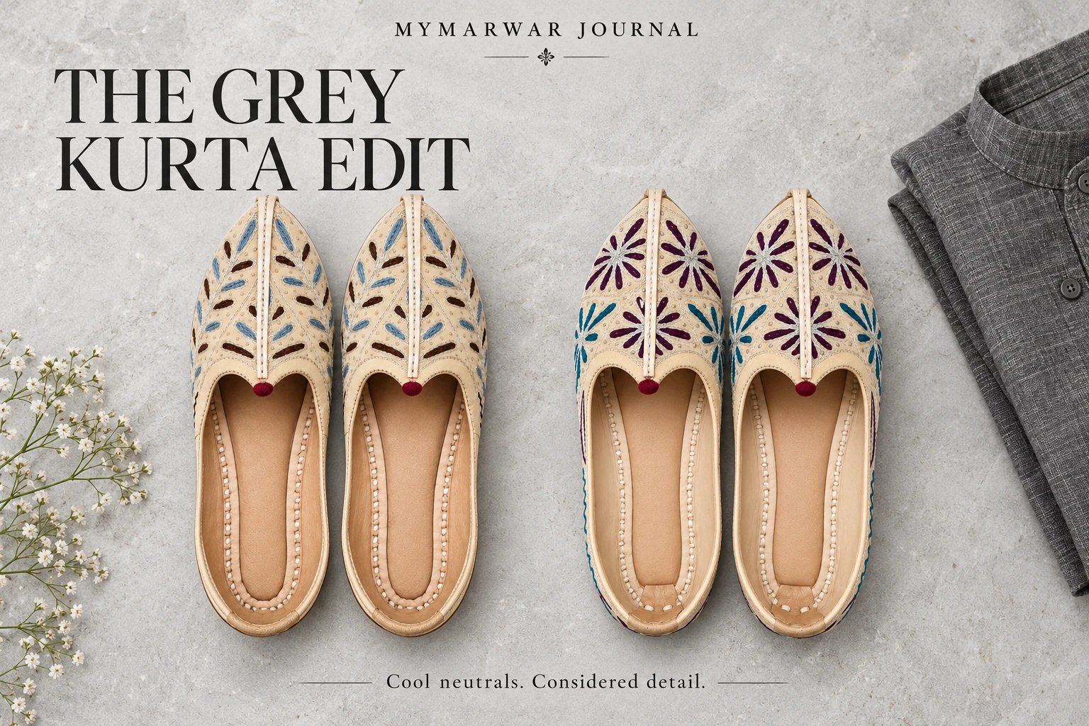 Two embroidered tan mojari designs on grey stone beside charcoal kurta fabric